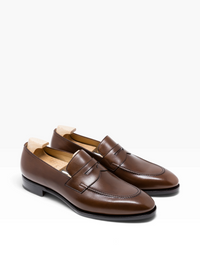 Bourgee a world class shoe store brown Vegano leather penny loafers with a rounded toe and Goodyear welted sole.
