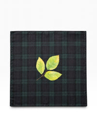 Bourgee a world class shoe store silk pocket square with a lime-green leaf print on a dark charcoal checkered pattern