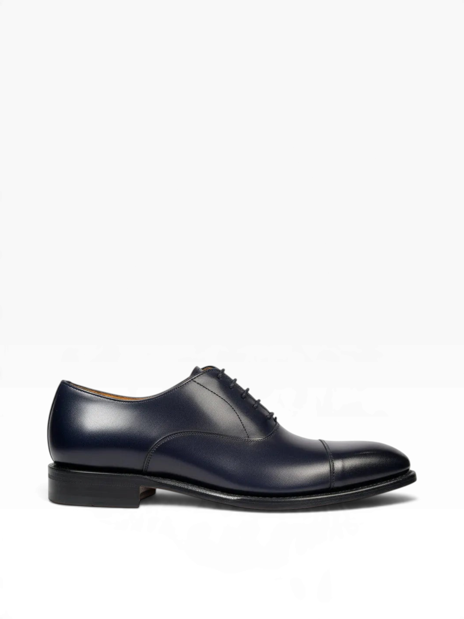 A Berwick navy blue box calf leather plain oxford toe cap shoe with a Goodyear welt construction.