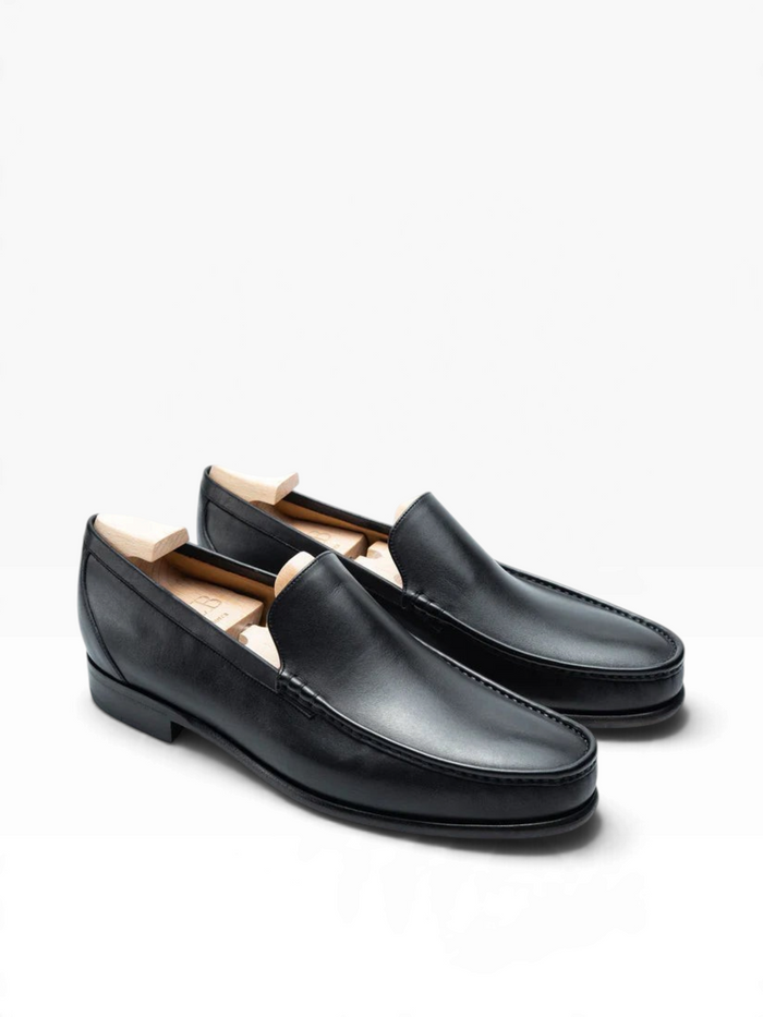 Bourgee a world class shoe store TLB Kiowa black Funchal leather penny loafers with a rounded toe and fusion sole.