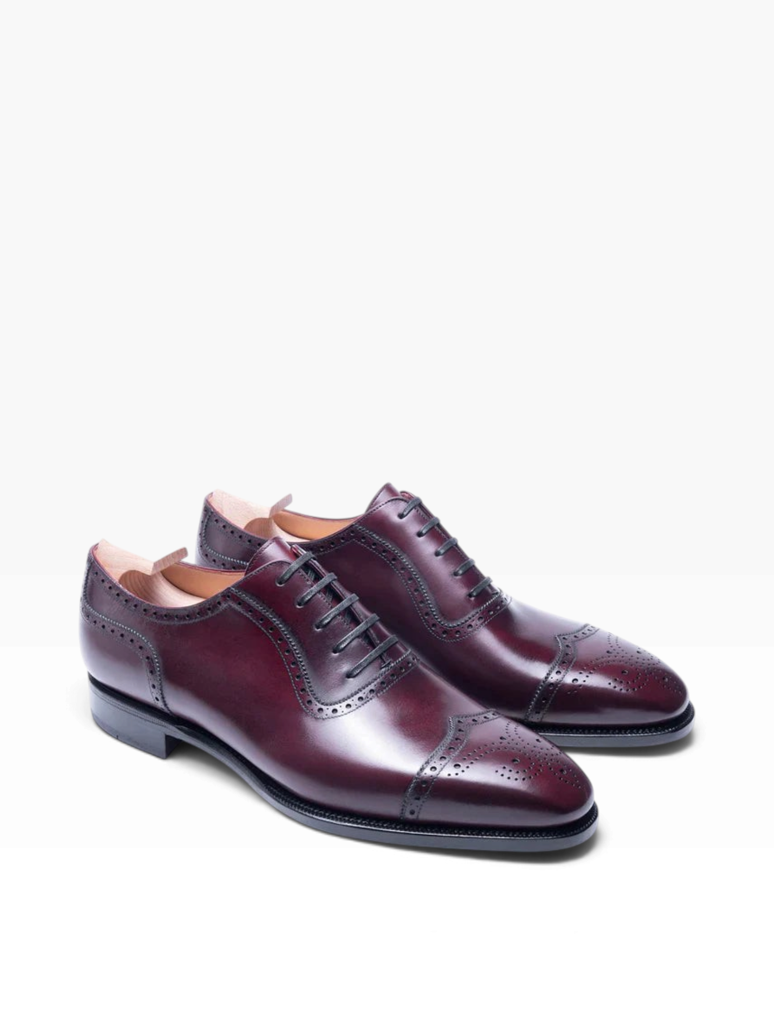 Bourgee a world class shoe store burgundy leather oxford shoes with brogue detailing and a squared toe design.