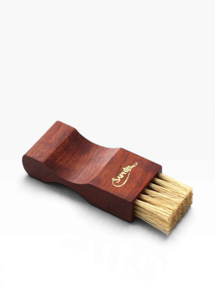 Bourgee a world class shoe store Saphir small spreading brush with bubinga wood handle and natural white bristles.