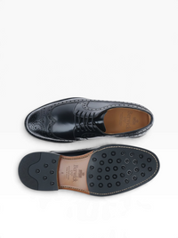 Bourgee a world class shoe store Berwick Rois black polished leather wingtip derby shoes with rubber lug soles