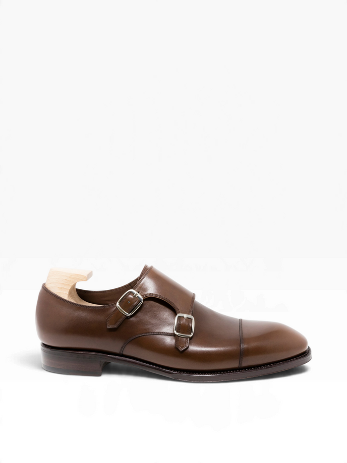 Bourgee a world class shoe store brown Vegano leather double monk strap shoe with silver buckles and a semi-square toe.