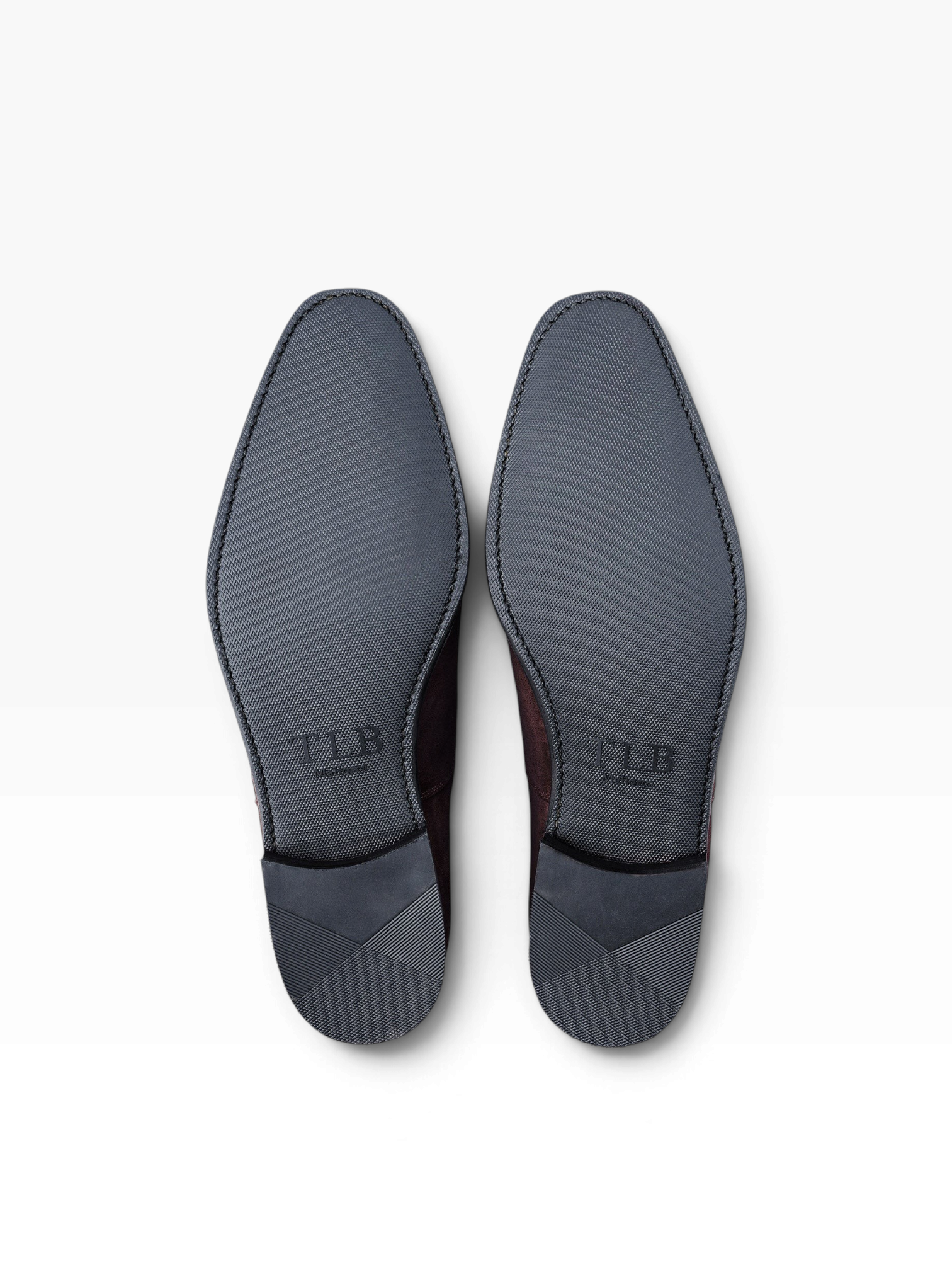 Bourgee a world class shoe store TLB Artista 181 boot featuring a durable textured rubber city sole with stitched edge