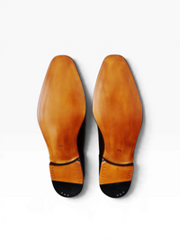 Bourgee a world class shoe store TLB Lancaster tassel loafers featuring smooth tan leather soles and black heels