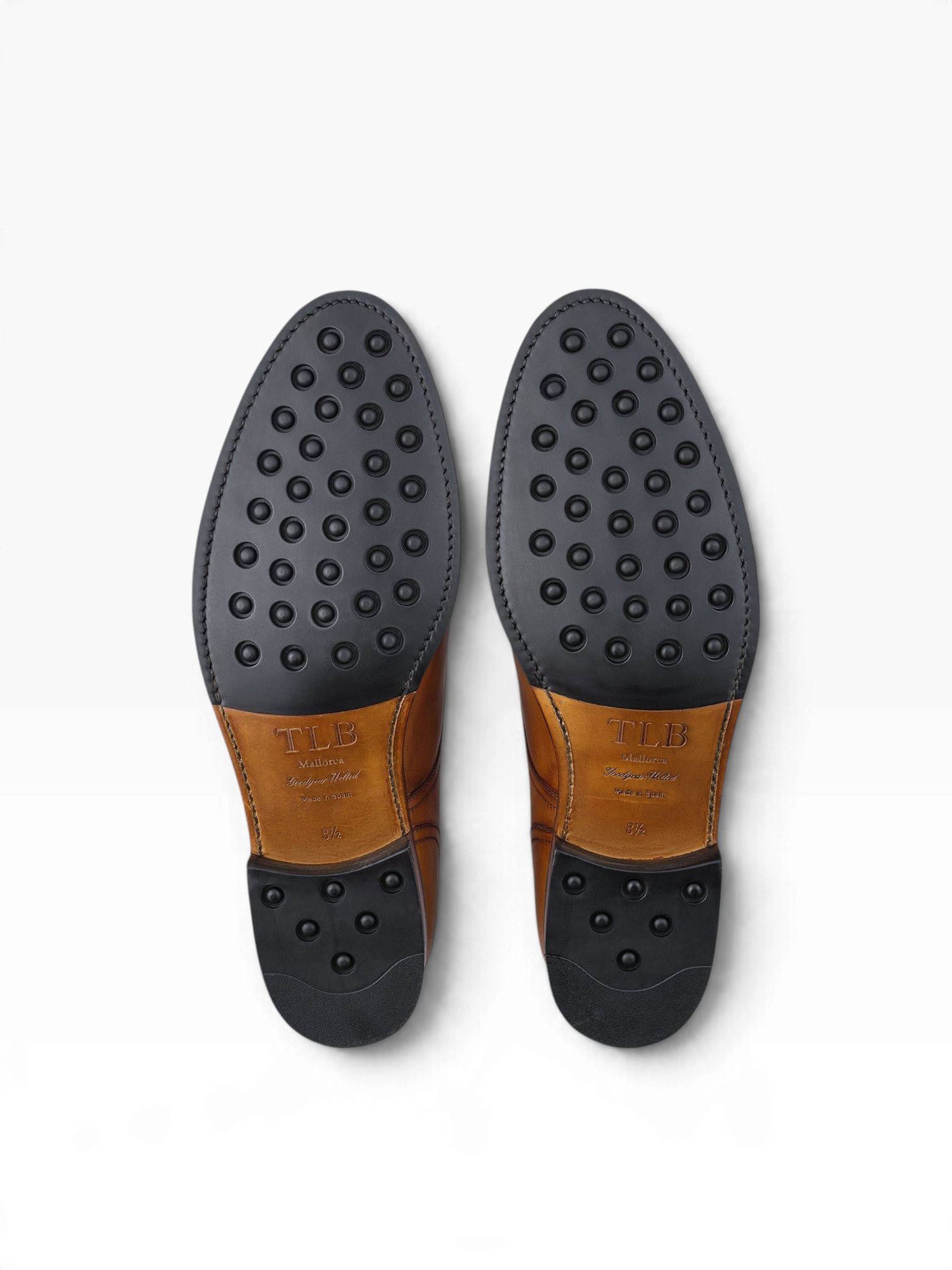 Bourgee a world class shoe store TLB Lenon dark brown leather derby shoes showing the black rubber SENIOR soles