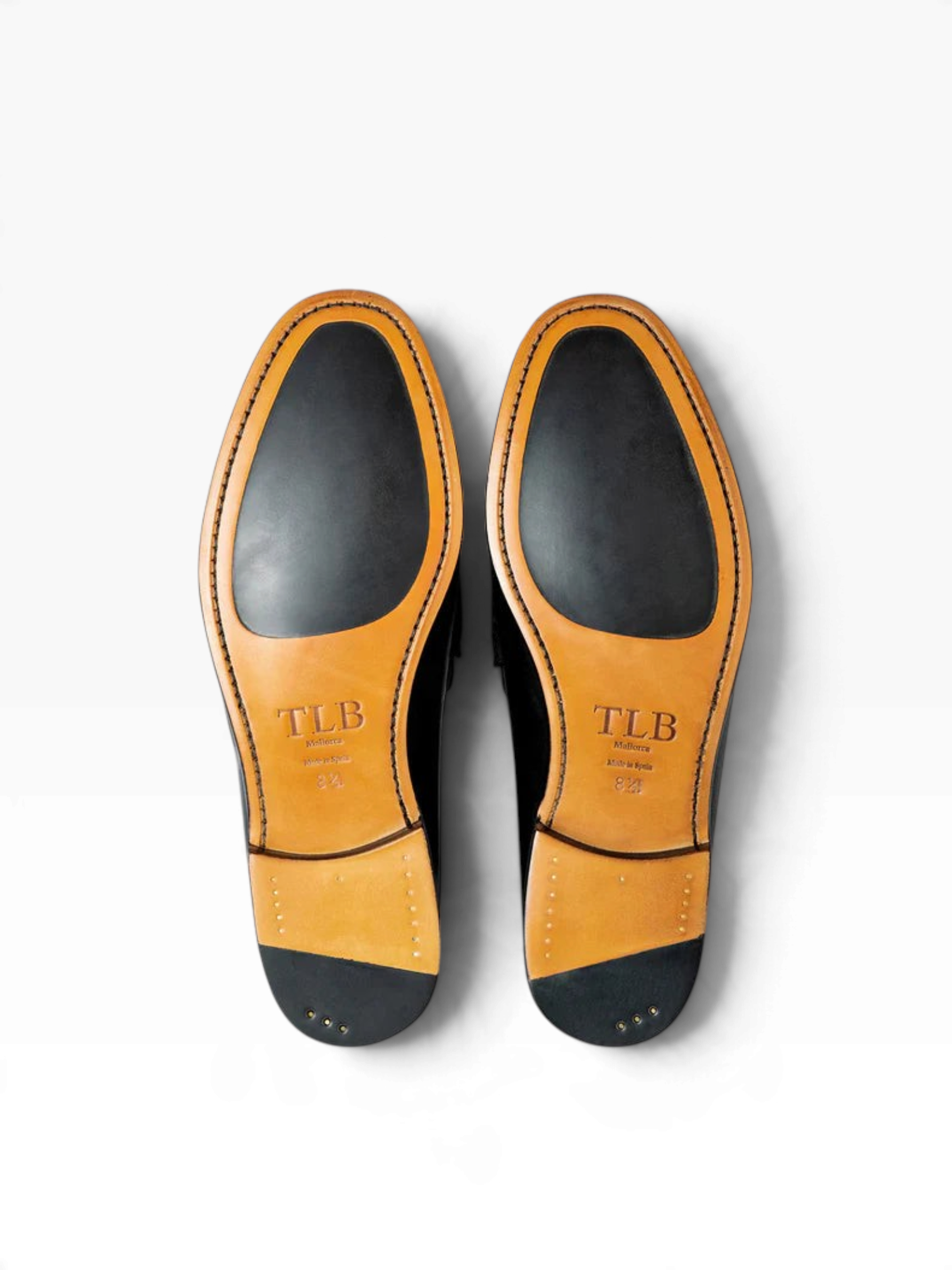 Bourgee a world class shoe store TLB Kiowa penny loafer showing the Fusion leather and rubber sole bottom view