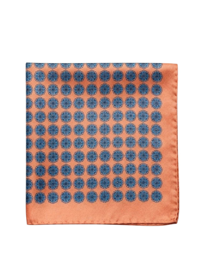 Bourgee a world class shoe store orange silk pocket square with a blue medallion print for formal suits and blazers.