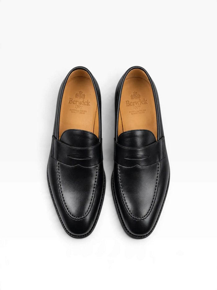 Bourgee a world class shoe store Berwick 5461 black leather penny loafers with apron detailing and Goodyear welt